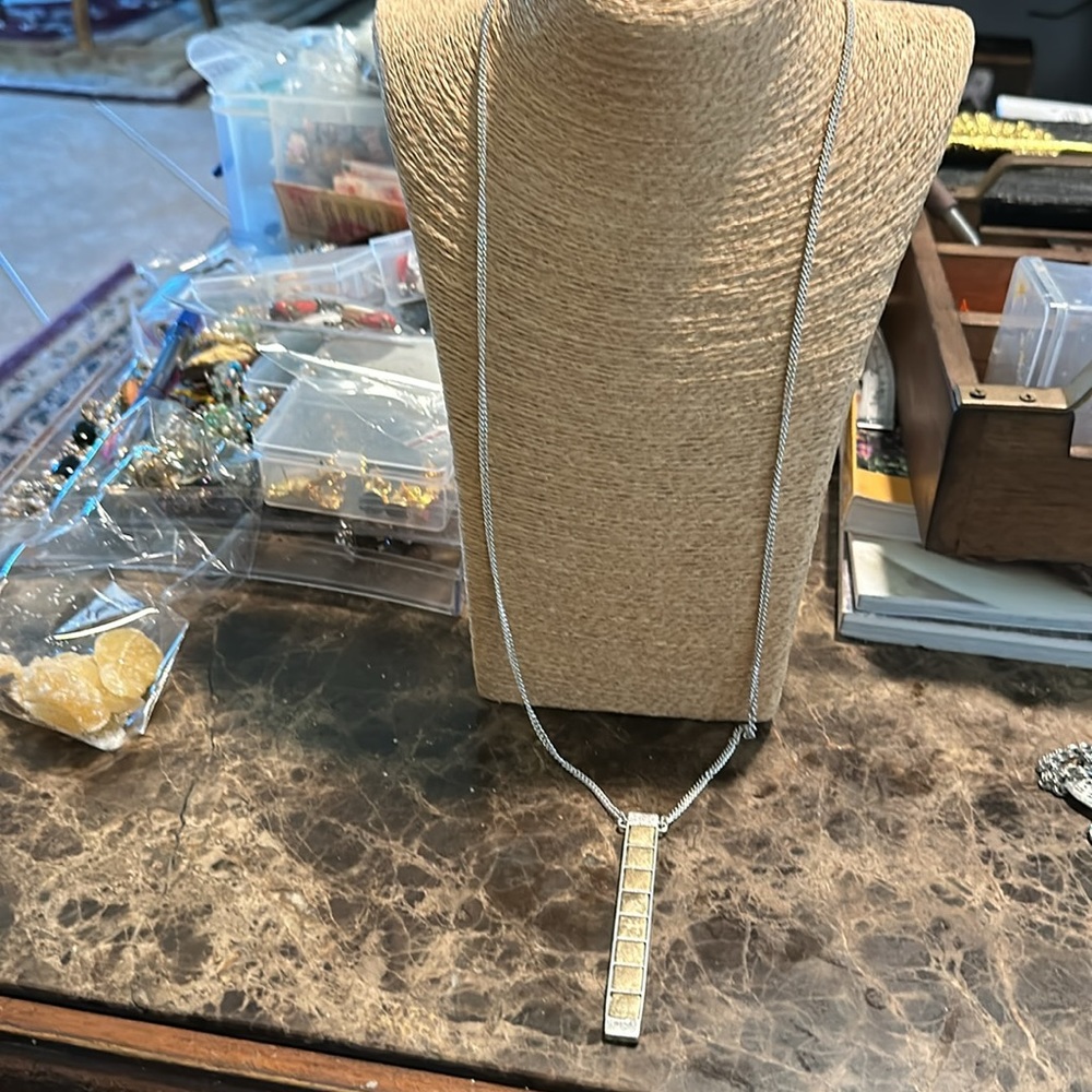 Long pendant abstract good and silver long chain in silvertone
